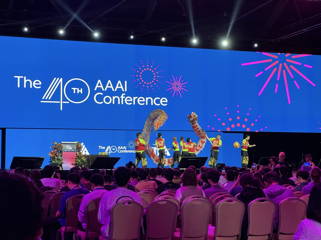 AAAI 2026 conference in Singapore featuring a traditional lion dance performance.
